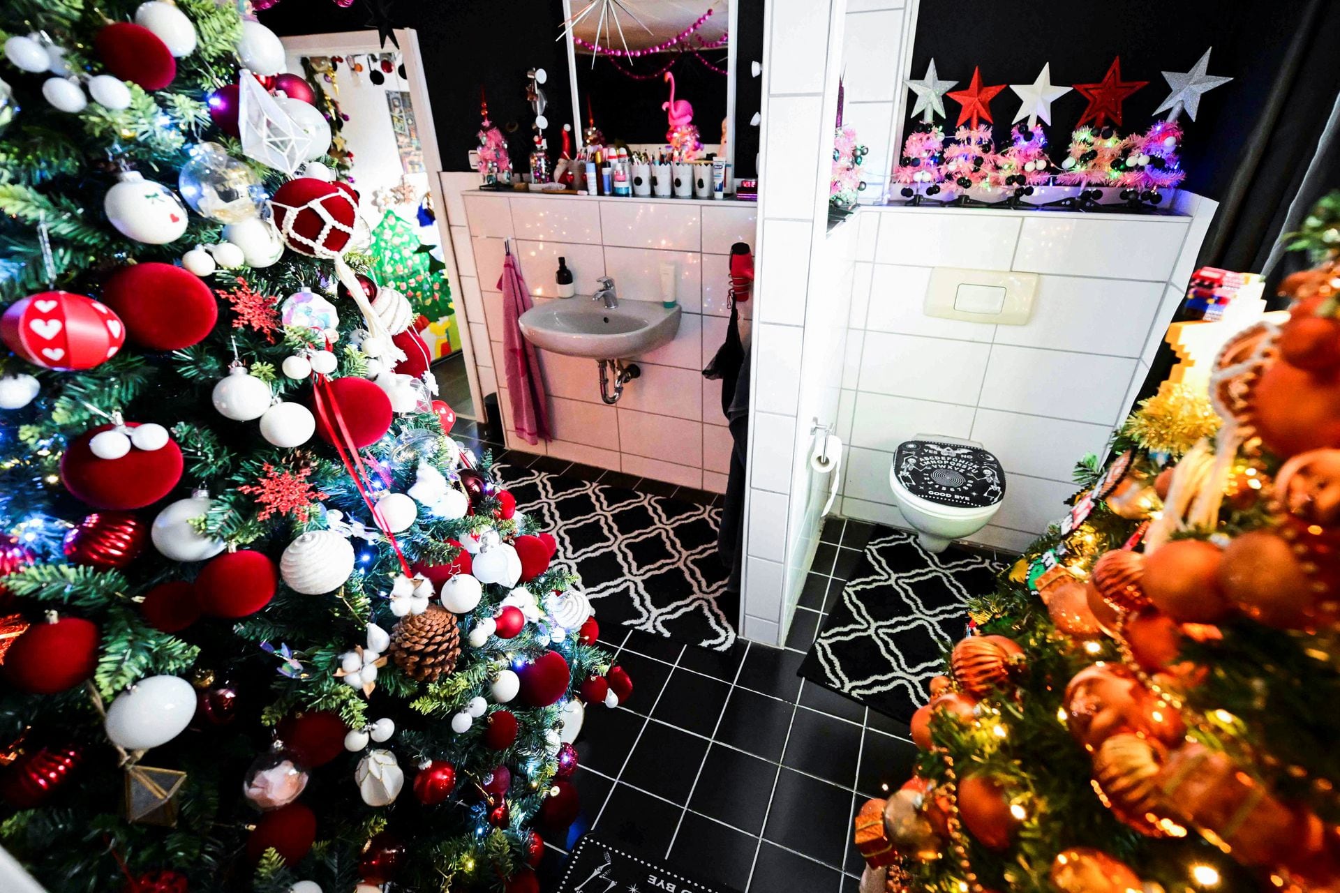 A family is breaking their own record for the most Christmas trees in their home