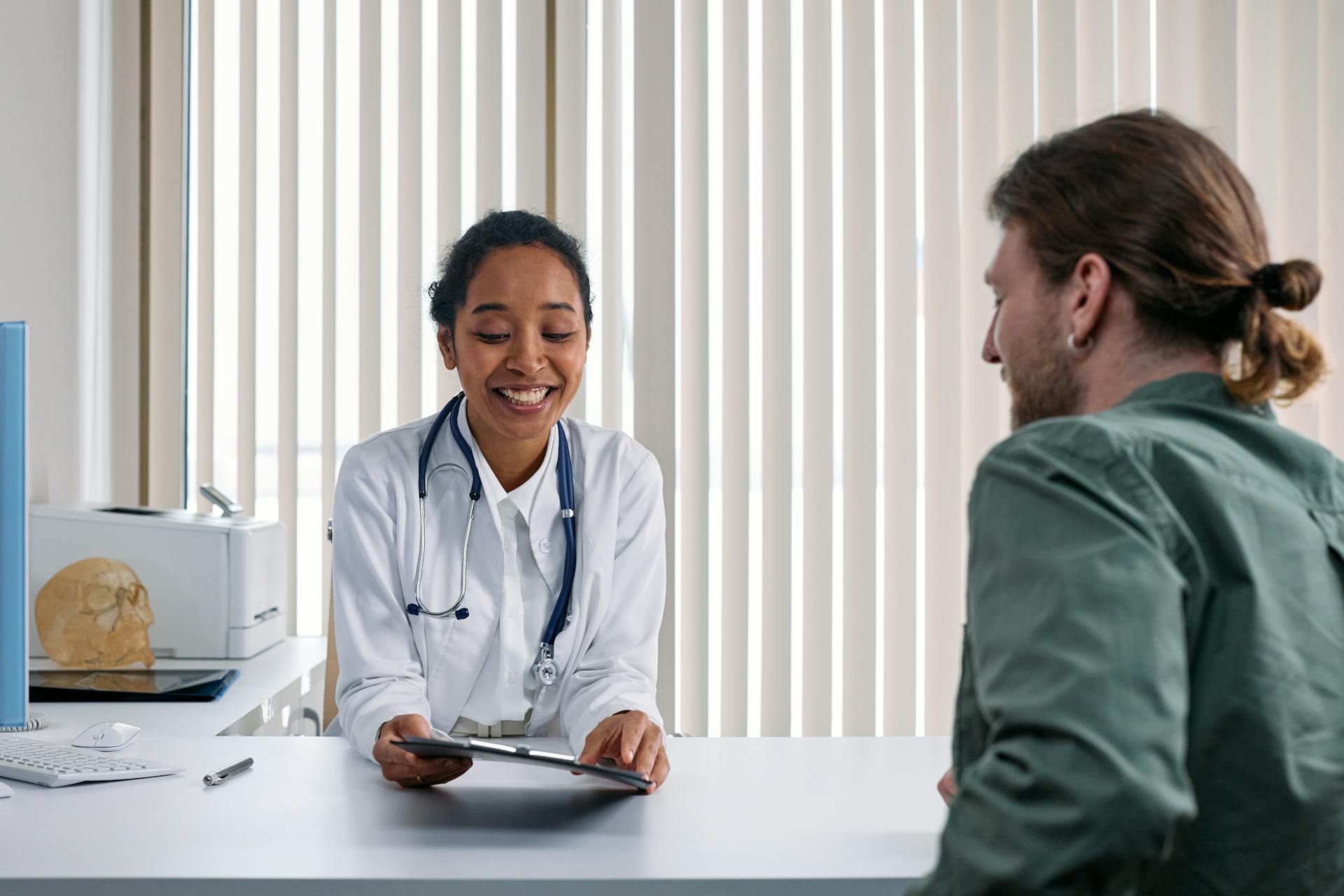 Doctor and patient talking | Source: Pexels