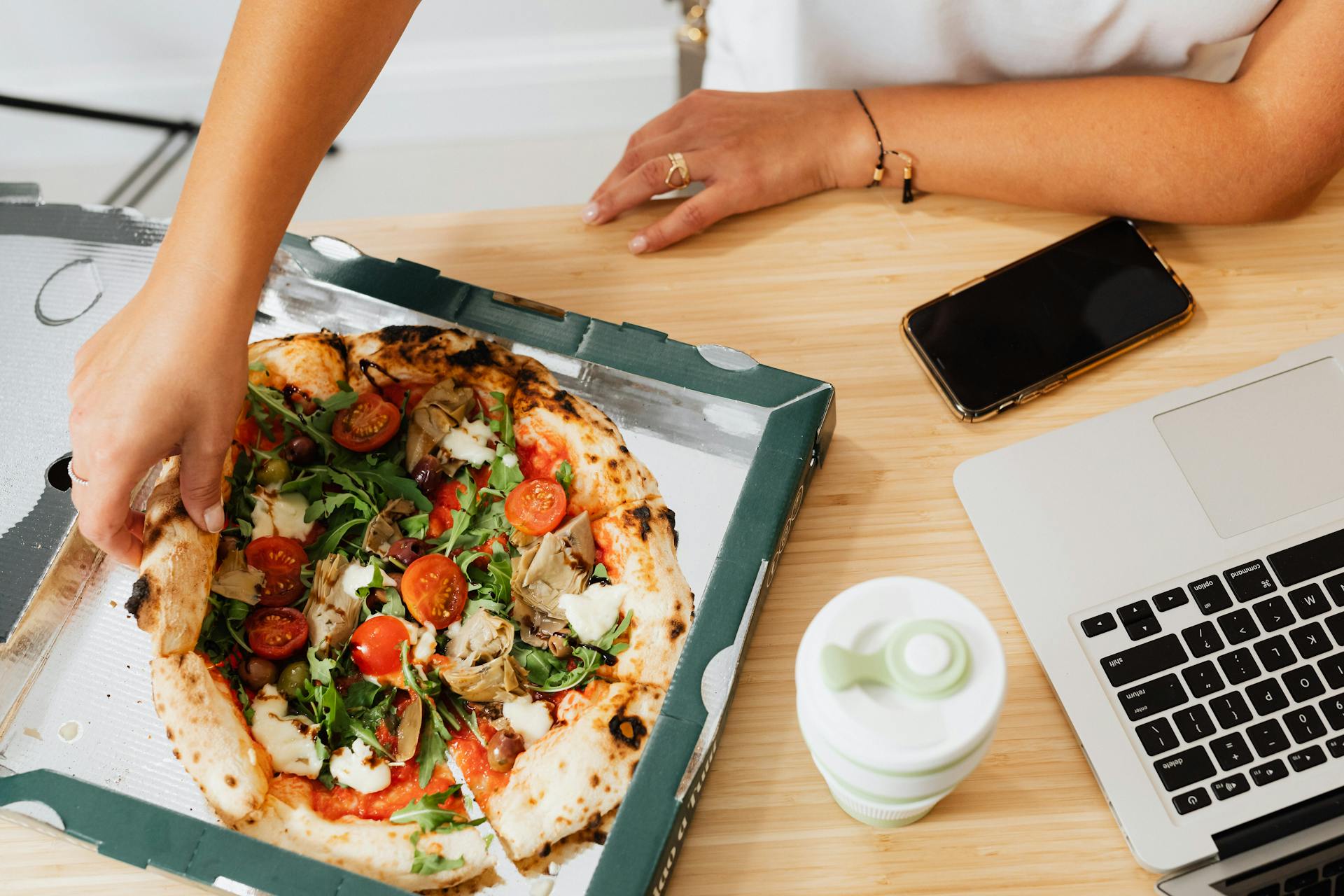 Pizza on table | Source: Pexels