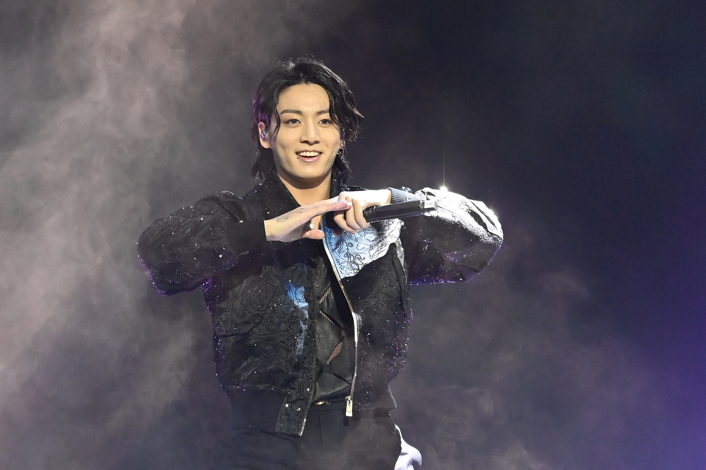 Jungkook of BTS performing during the opening ceremony prior to the FIFA World Cup Qatar 2022 Group A match between Qatar and Ecuador at Al Bayt Stadium on November 20, 2022 in Al Khor, Qatar | Source: Getty Images