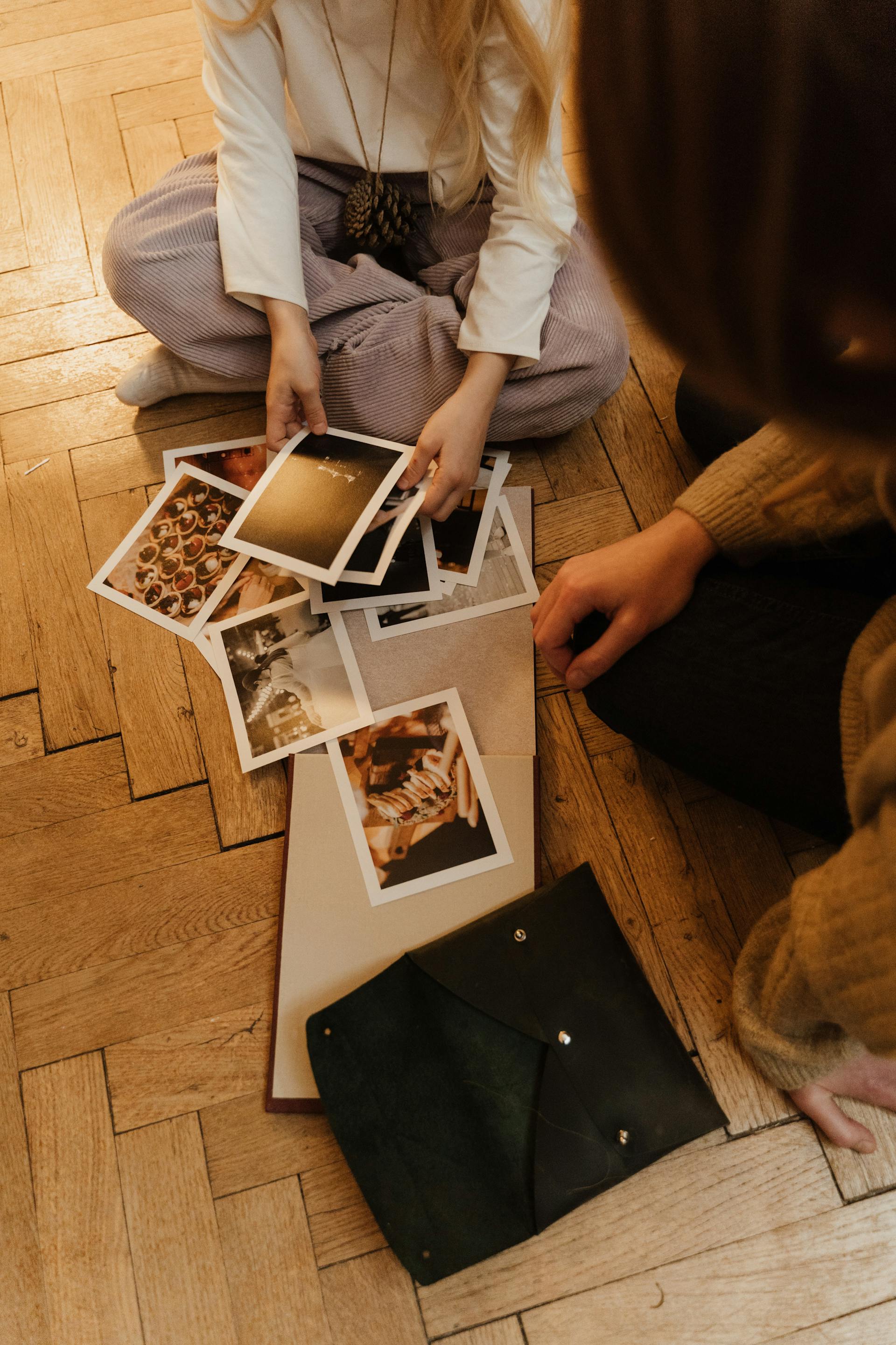 Women looking at photos | Source: Pexels