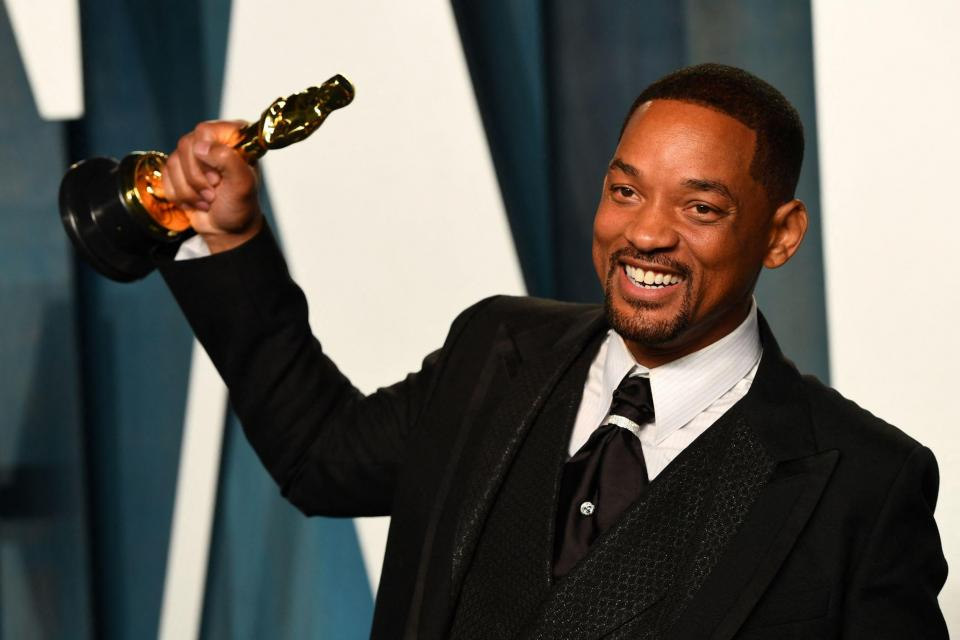 Will Smith receiving the Best Actor award for his performance in "King Richard."
